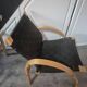 pair set of 2 armchairs with a wooden frame and black fabric weaving