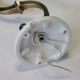 Pair of brass gooseneck wall sconces and glass globe vintage porcelain rosette