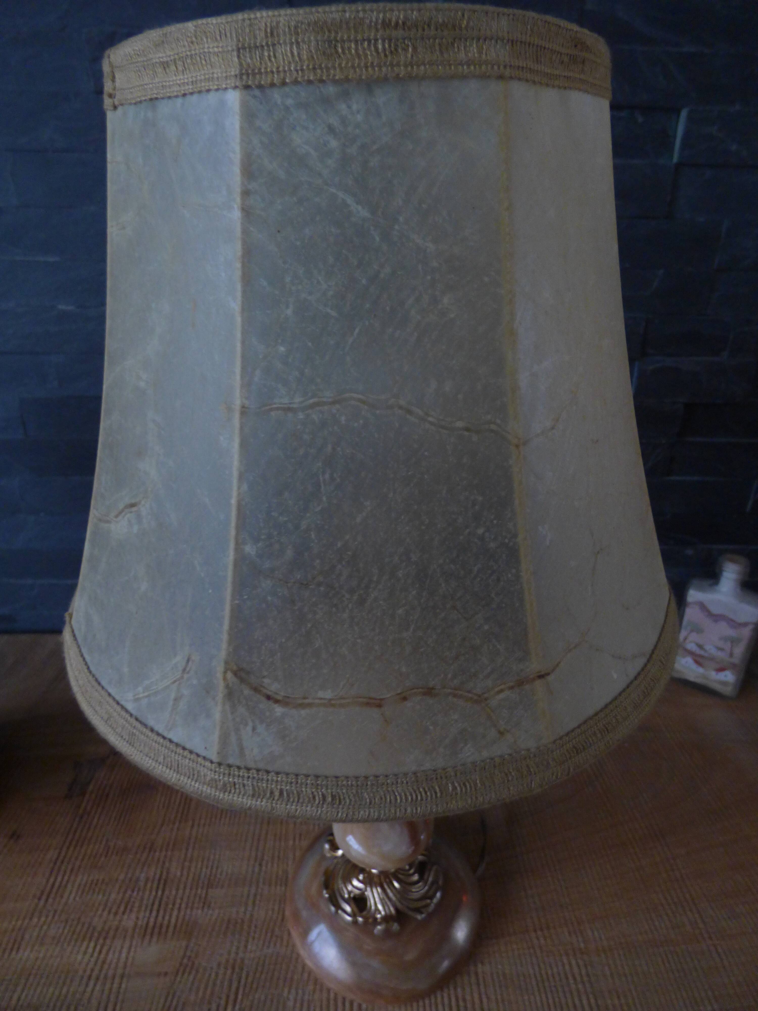 Lamp with base in polished beige-brown stones and its leather lampshade