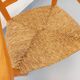Vintage armchair in beech wood and straw from the 1950s.