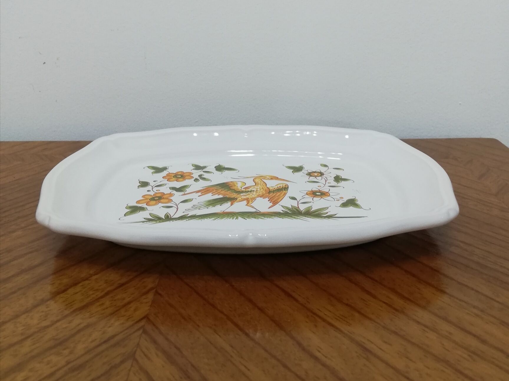 Earthenware dish signed Moustiers