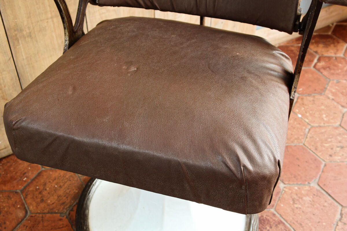 Hairdresser's armchair, early twentieth, enamelled cast iron