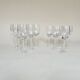 Set of six cut crystal wine glasses and six water glasses.