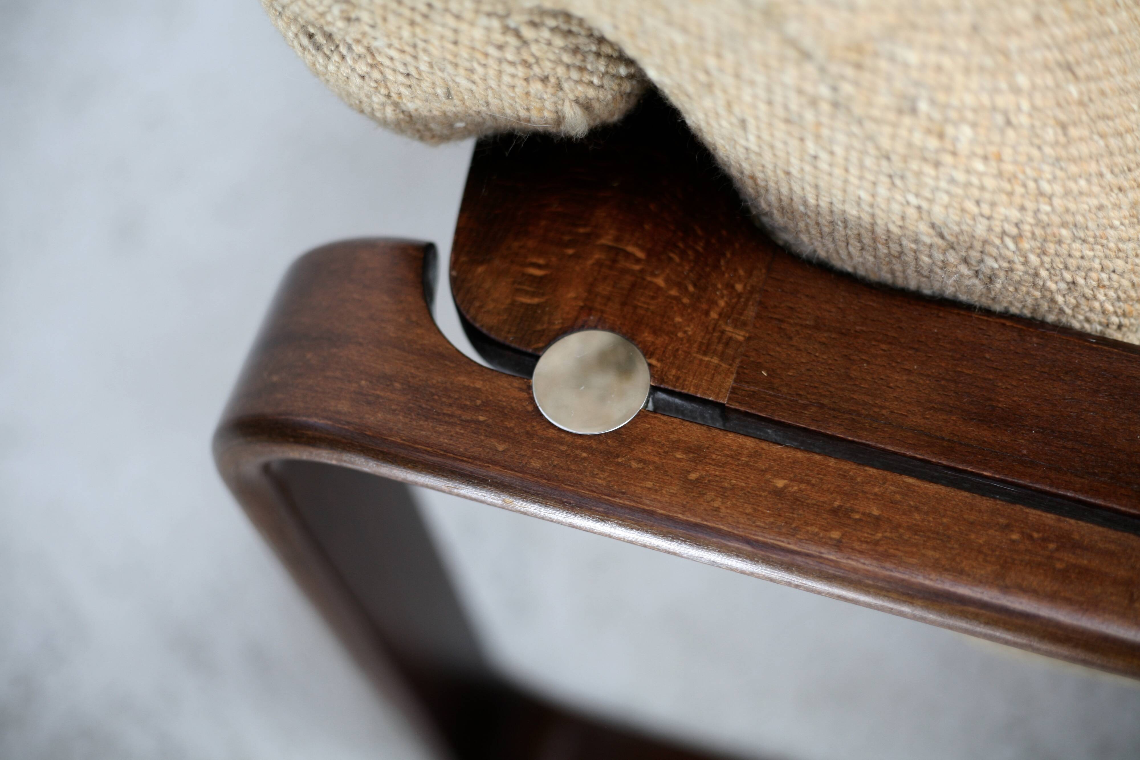 Modernist armchair. Wool, wood and steel. Circa 1970