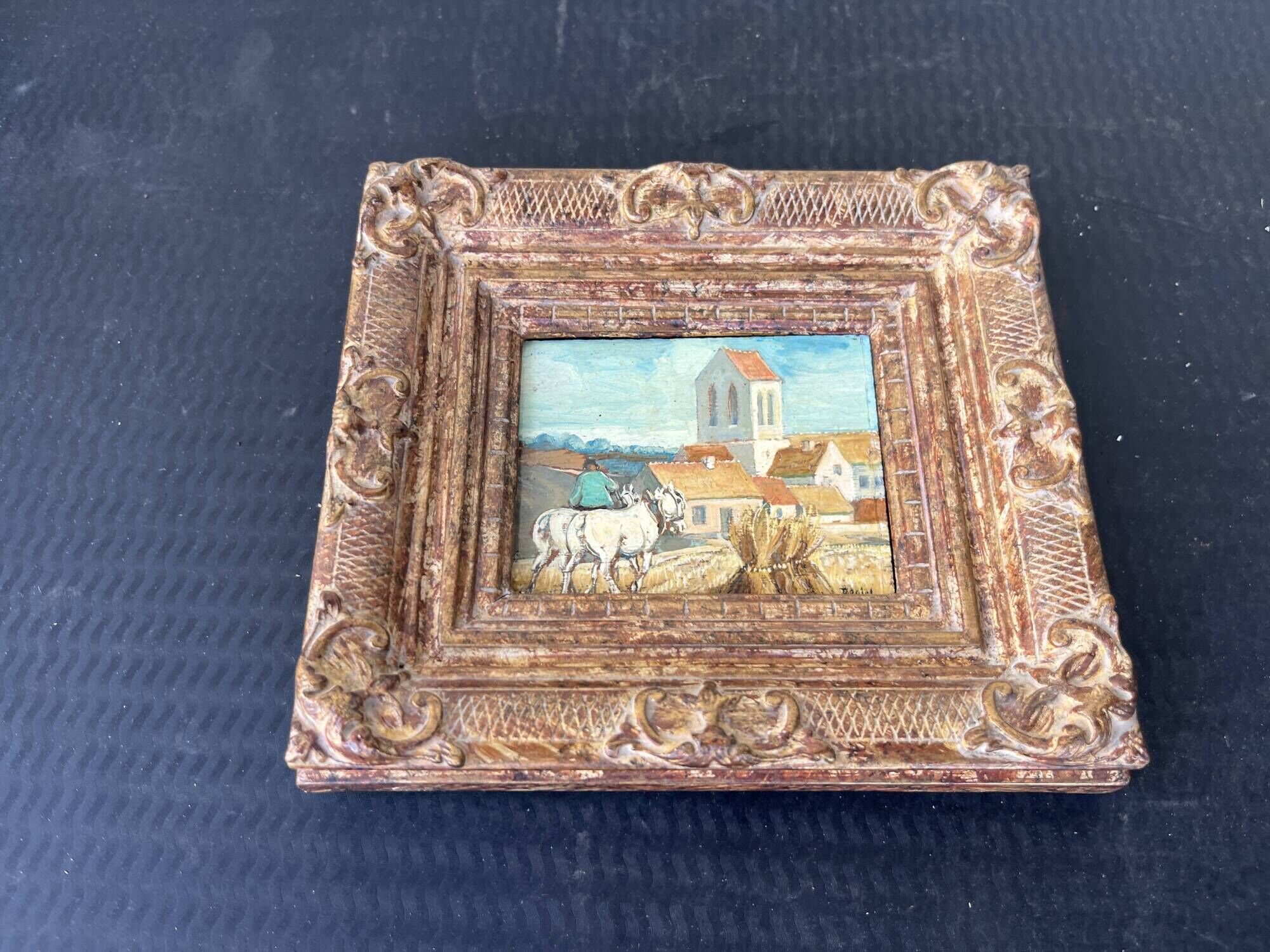 Small old painting signed Daniel Rouvière – Village scene with horses
