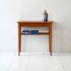 Scandinavian vintage teak nightstand with slatted shelf