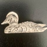 12 metal duck-shaped knife holders