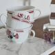 Trio of large antique chocolate cups (Fénal Badonviller – “Red Rose” decoration)