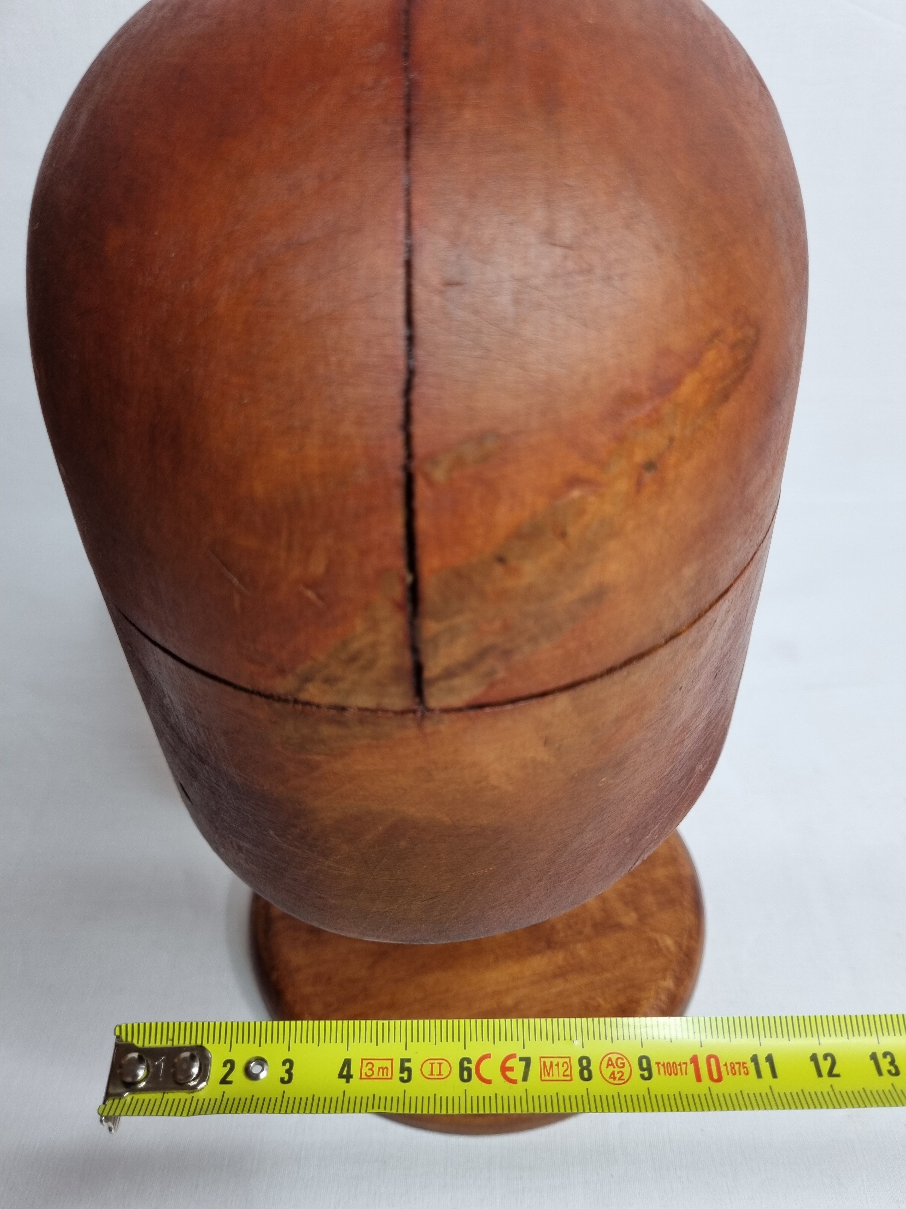 Old wooden hat shape on foot, 1900