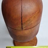 Old wooden hat shape on foot, 1900