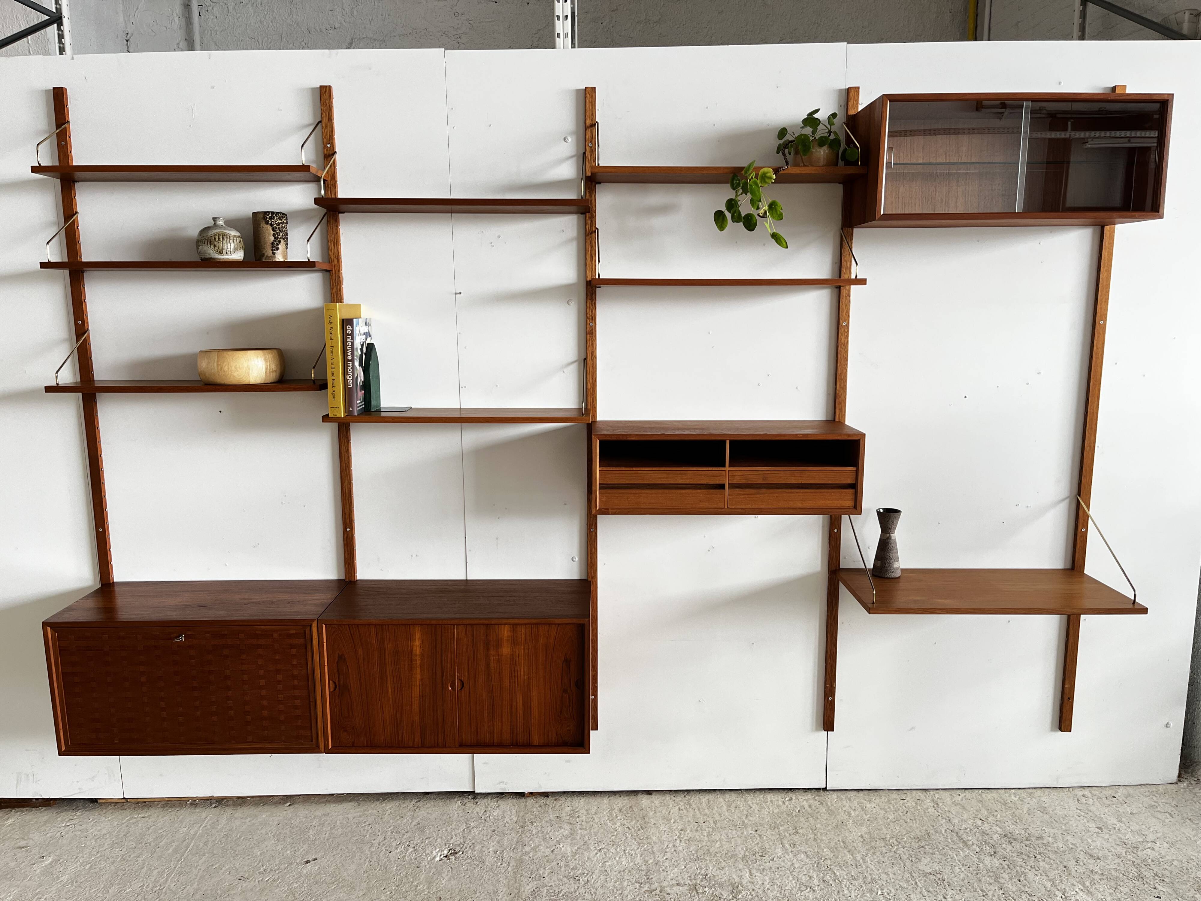 A wall unit with 4 compartments by Poul Cadovius, Denmark, 1960s.