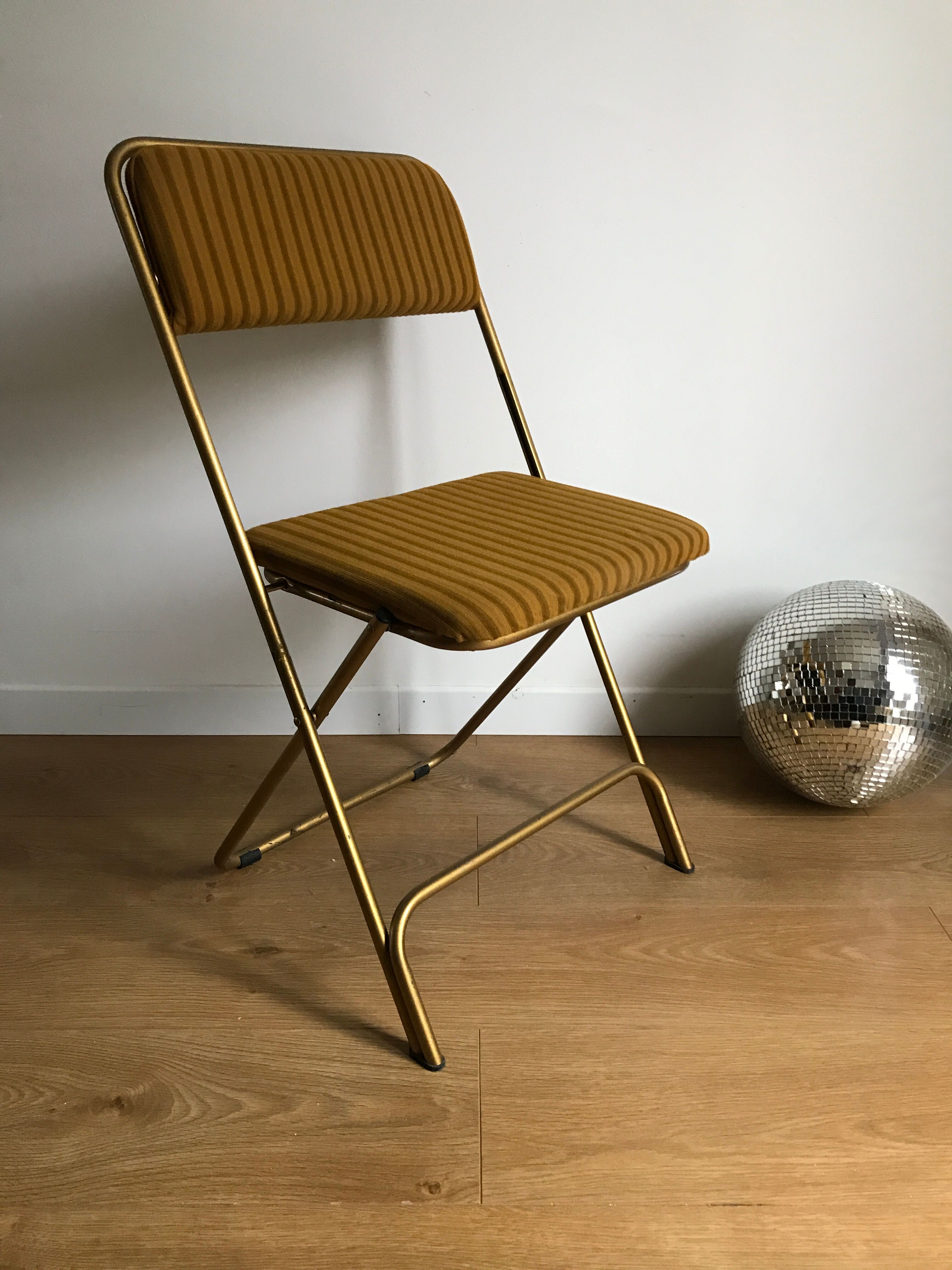 Vintage folding chair lafuma chantazur with striped gold fabric