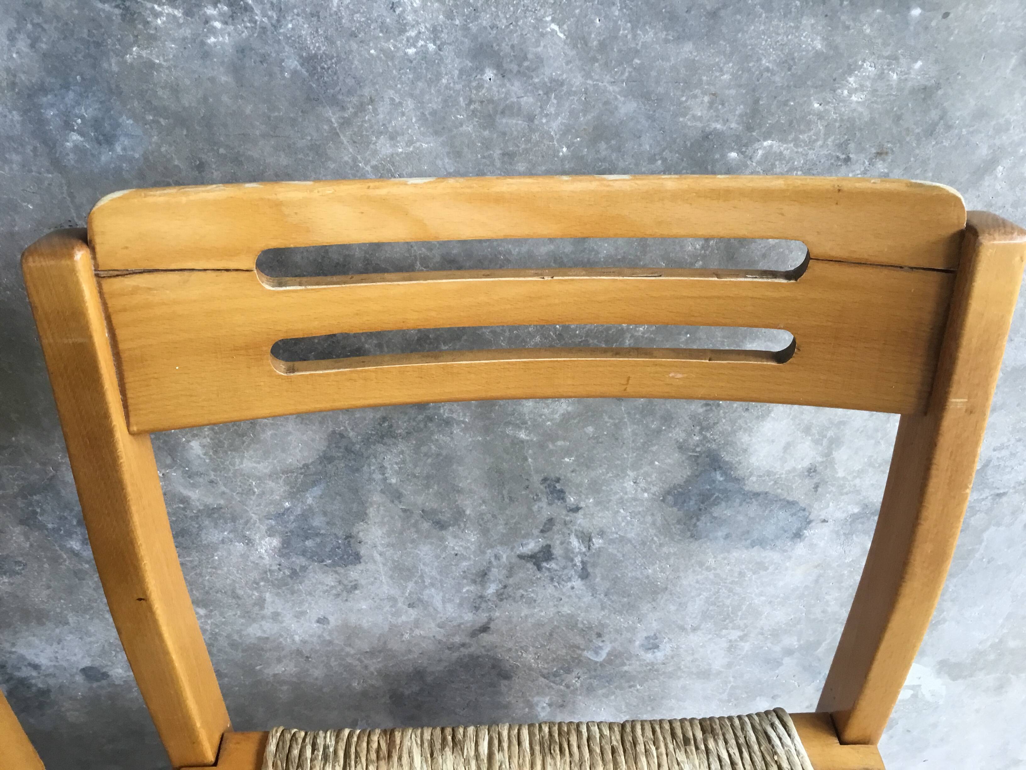 Set of 4 straw chairs in light wood - design 1970