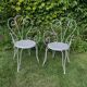 Paire d’anciens fauteuils de jardin en fer forgé