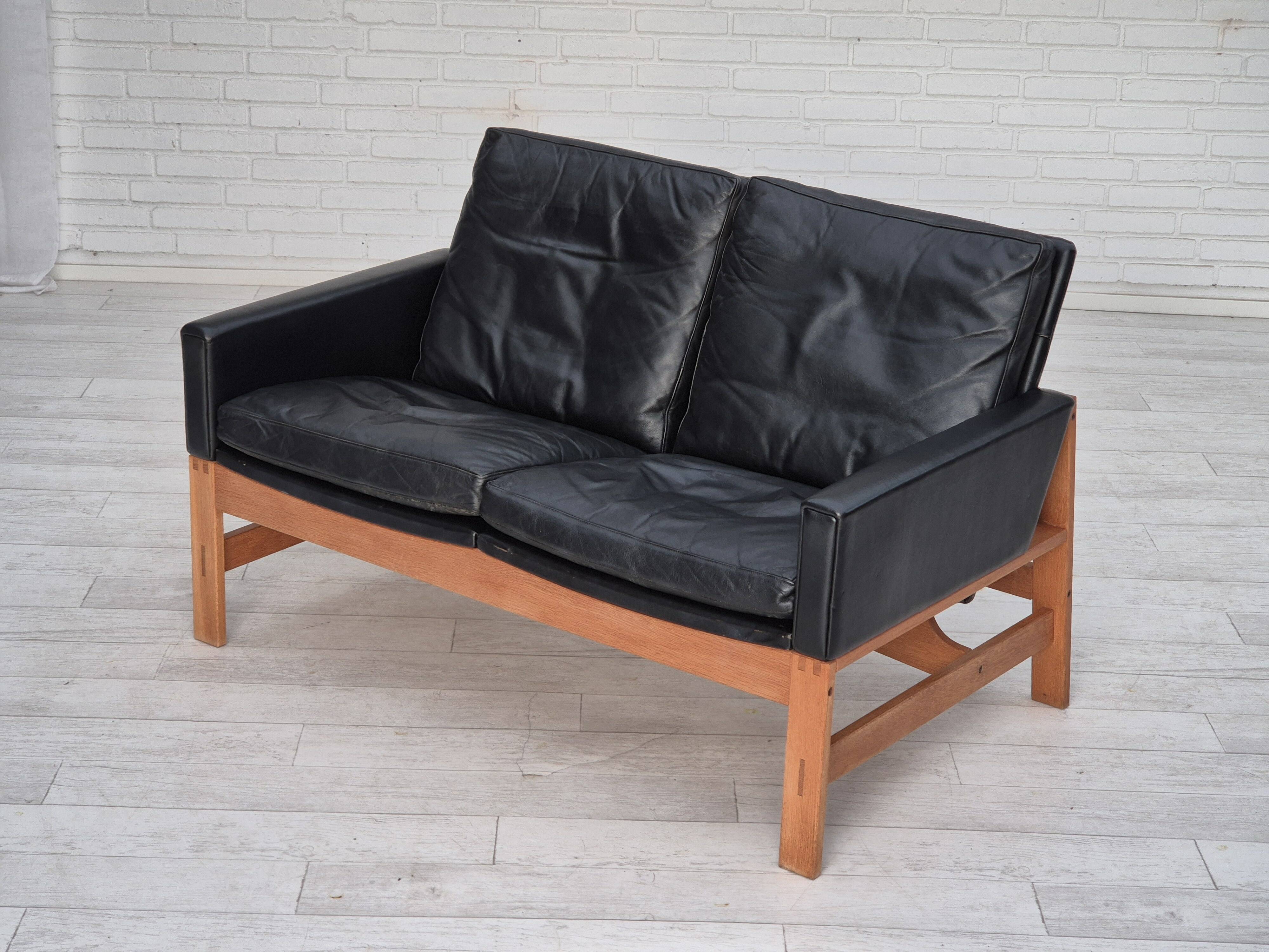 1960s, Danish 2-seater sofa in original condition, furniture leather, solid oak wood.
