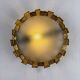 Brutalist crown sunburst fixture in gilt metal and frosted glass, France, 1960s