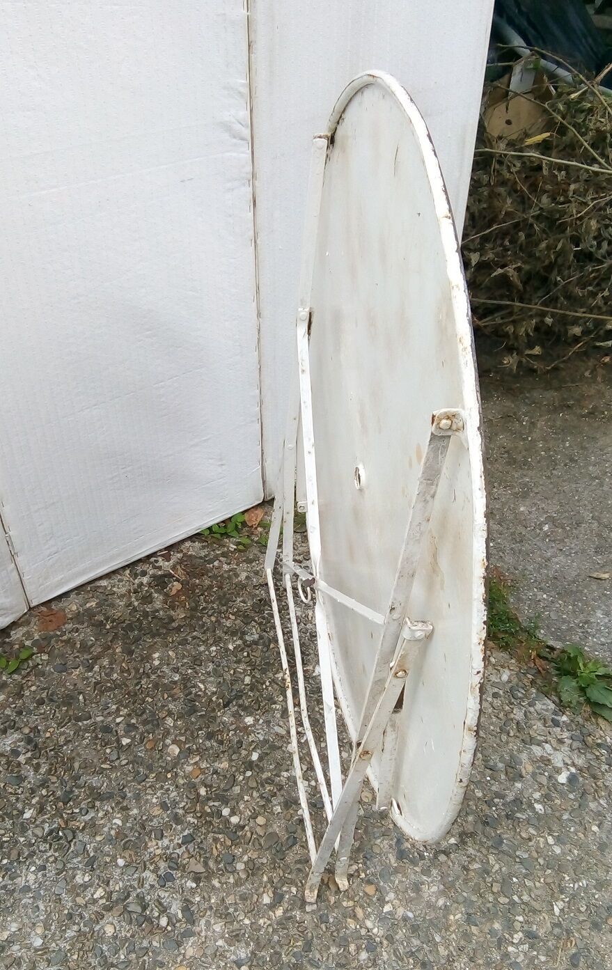 Old folding iron garden table