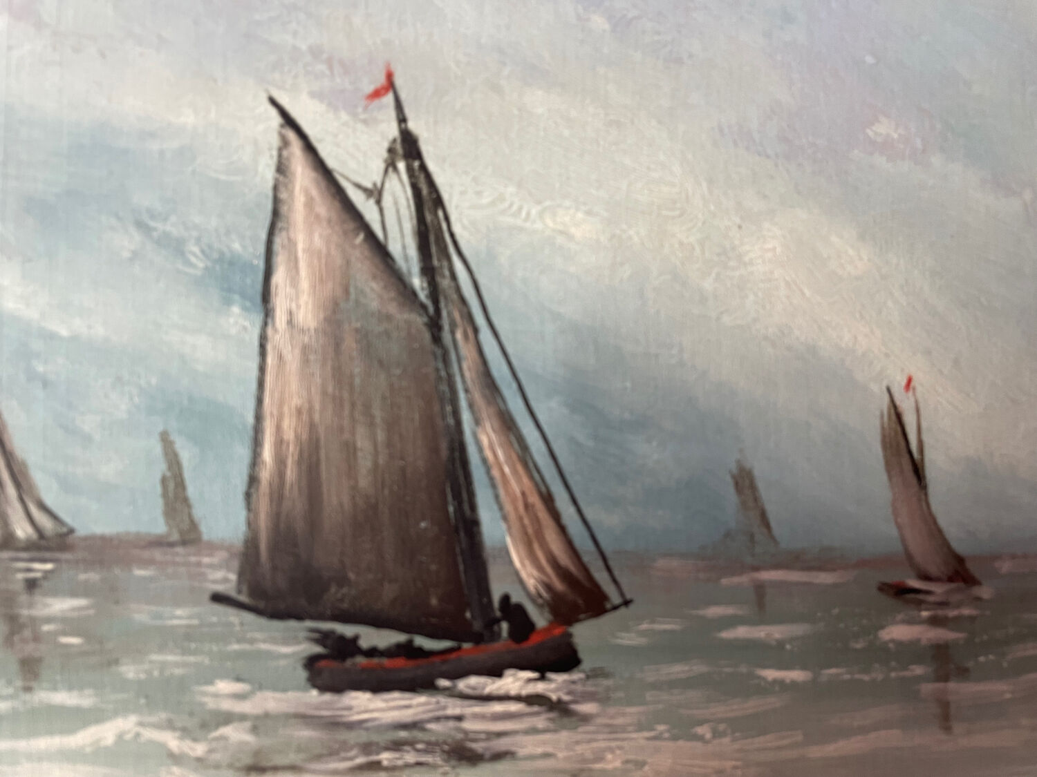 A pair of old paintings on wood.