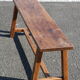 Dark wood bench