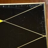 Brass and glass coffee table with compass feet