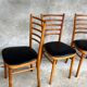 Set of 4 vintage wooden chairs with faux leather.
