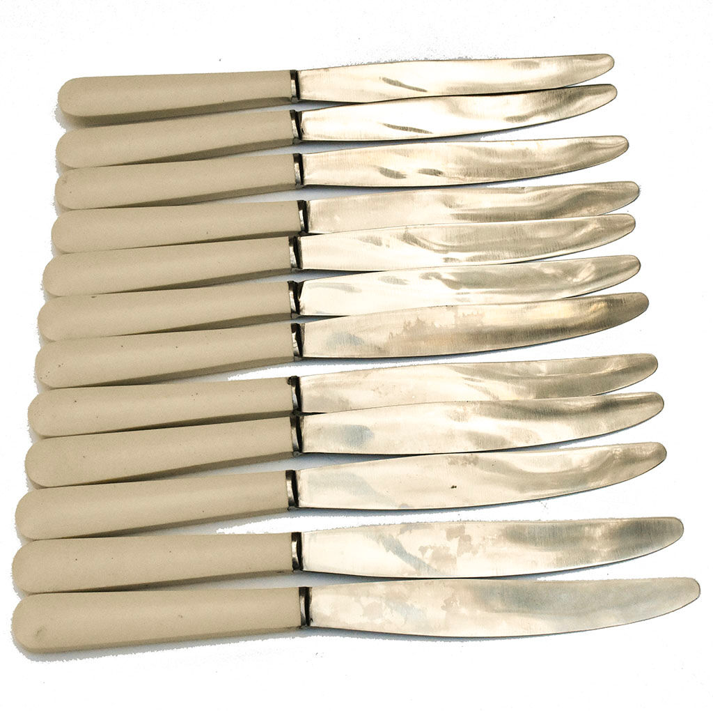 Lot 12 steel knives old vintage white sleeve