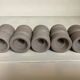 Five matte gray candle holders