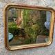 Louis-Philippe mirror gilded with gold leaf
