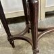 Dark wood piano bench