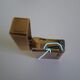 2 st dupont lighters, gold plated, punches, numbered, 1 striated pattern, 1 hammered pattern, 70s