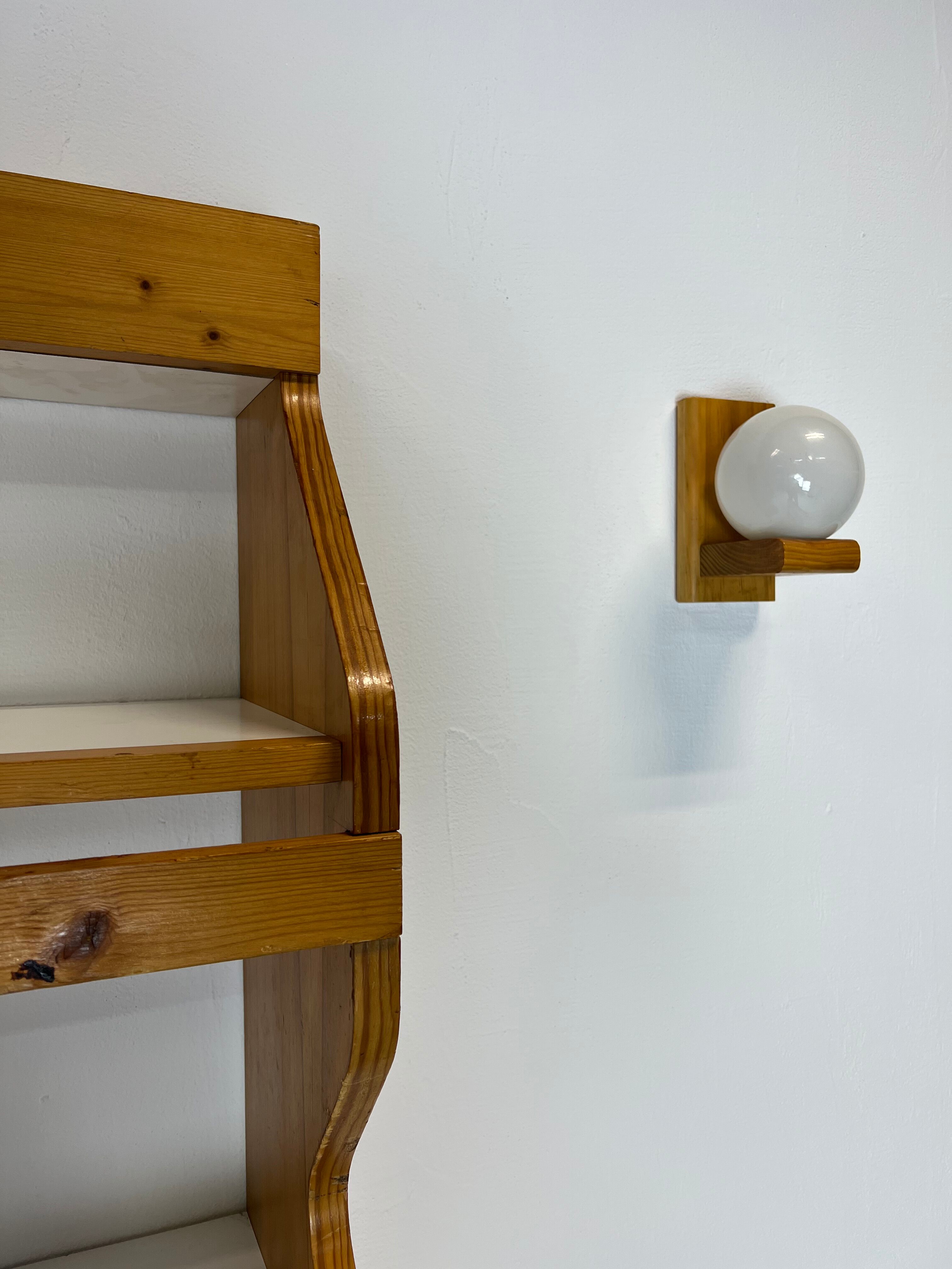 Duo of shelves by Charlotte Perriand