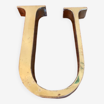 Golden sign letter “U”