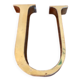 Golden sign letter “U”