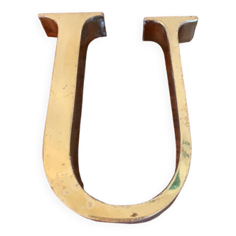 Golden sign letter “U”