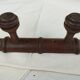 Wooden coat rack turned two hooks