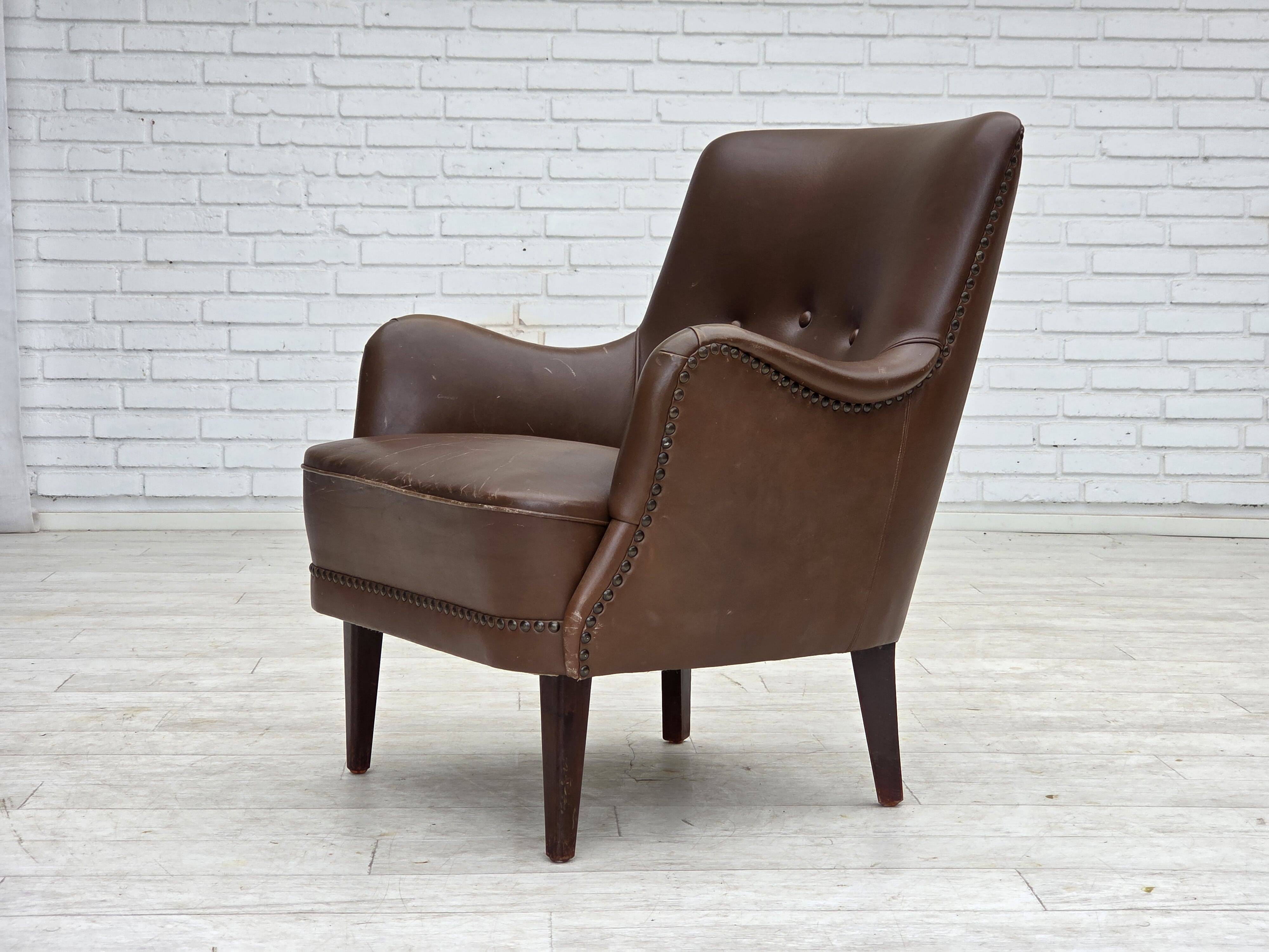 1960s, Danish armchair, furniture leather, ash wood legs.