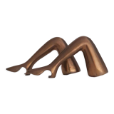 Set of brass bottle openers in the shape of legs