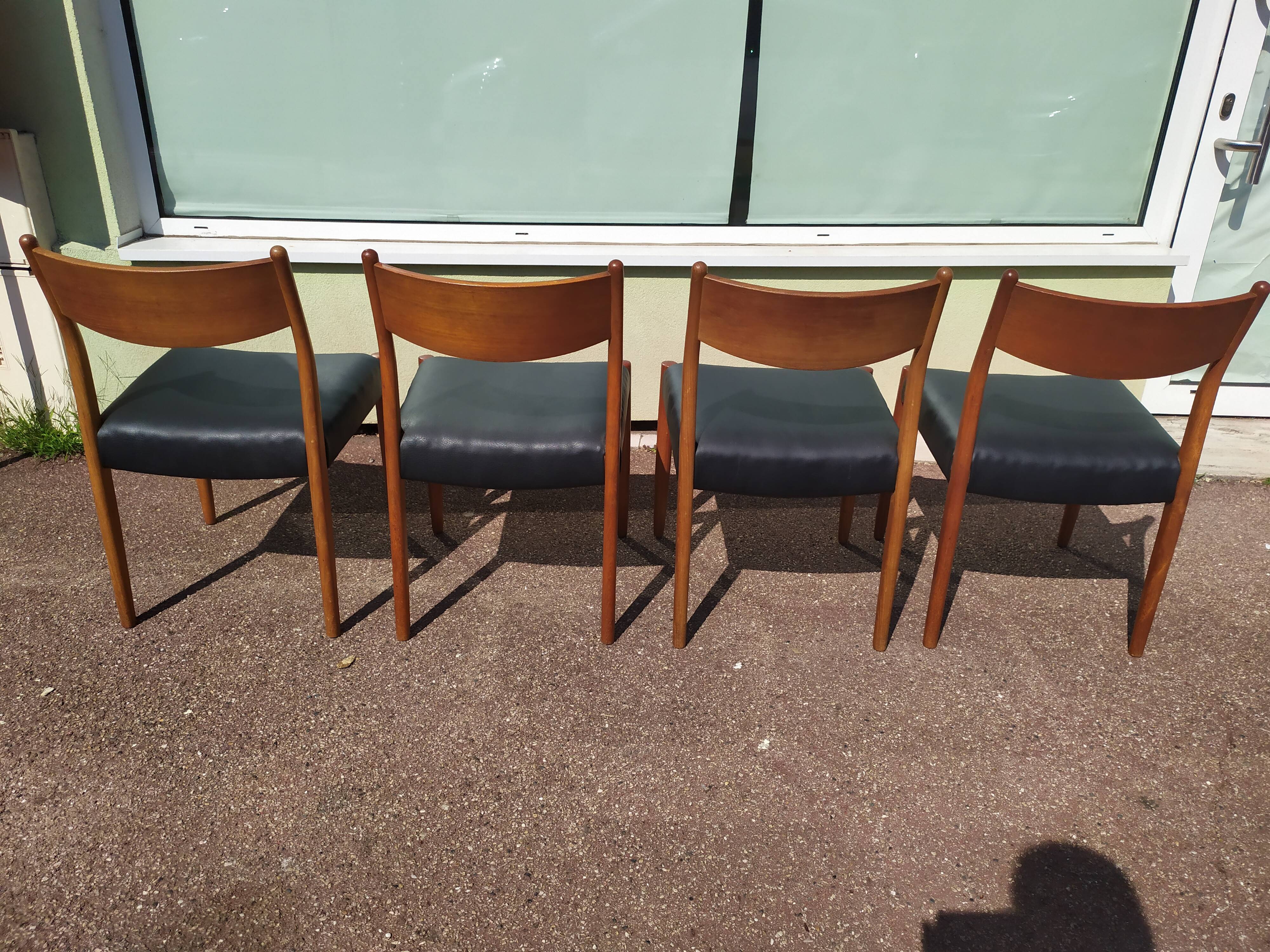 Set of 4 Scandinavian teak chairs in black leather
