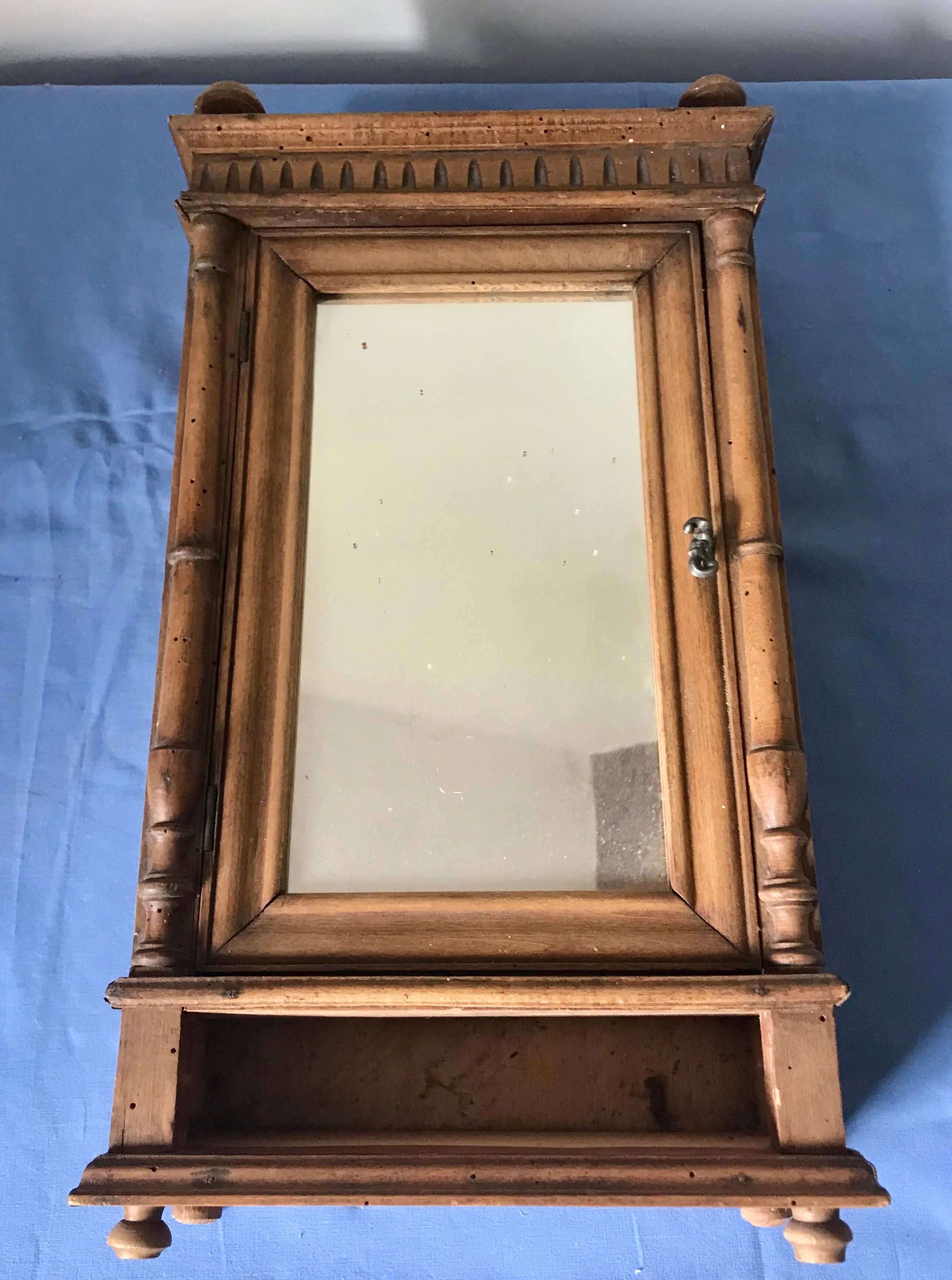 Ancient doll cabinet