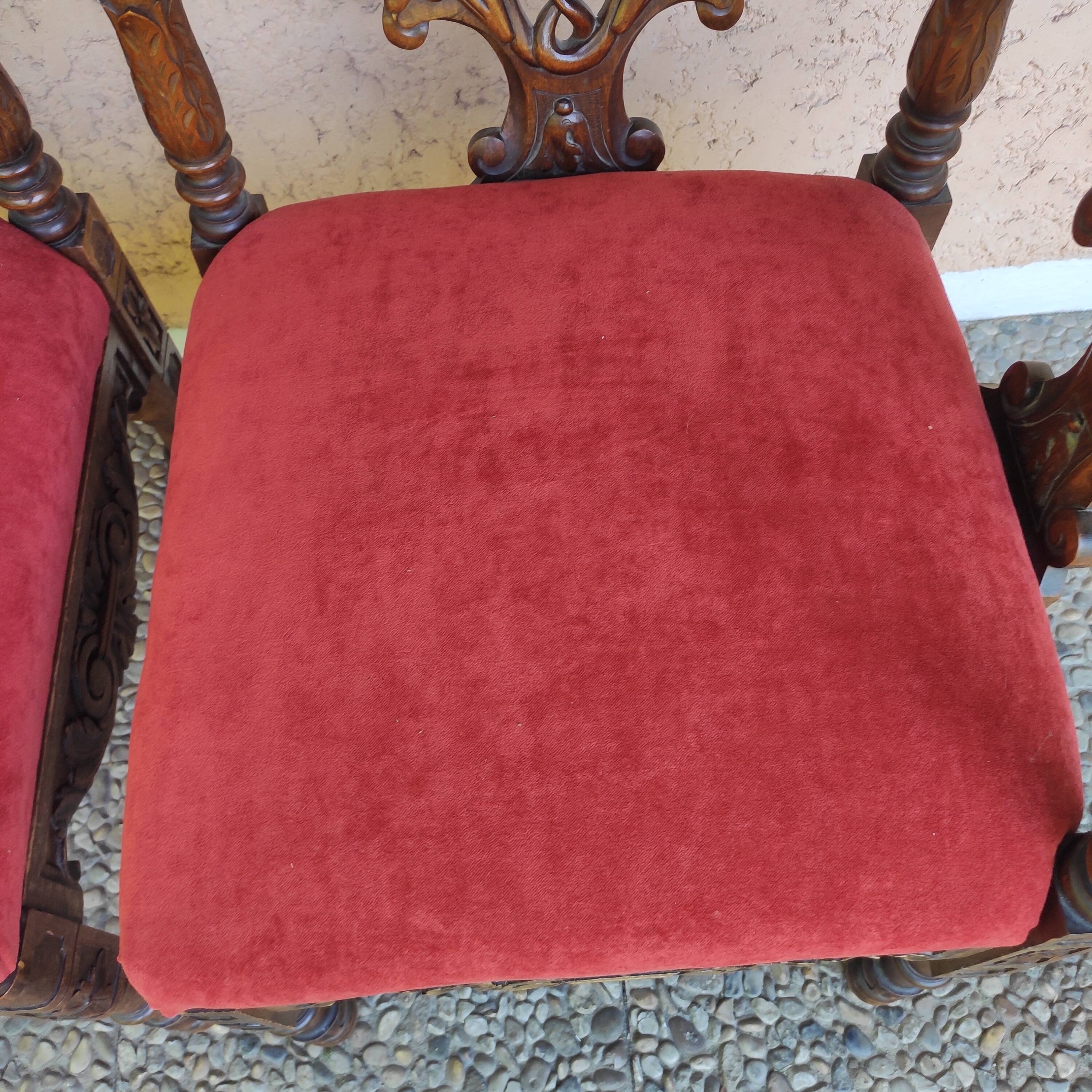 Pair of neo-Renaissance Henri II corner armchairs in carved wood, 19th century.