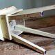 Workshop stool in antique patinated solid wood