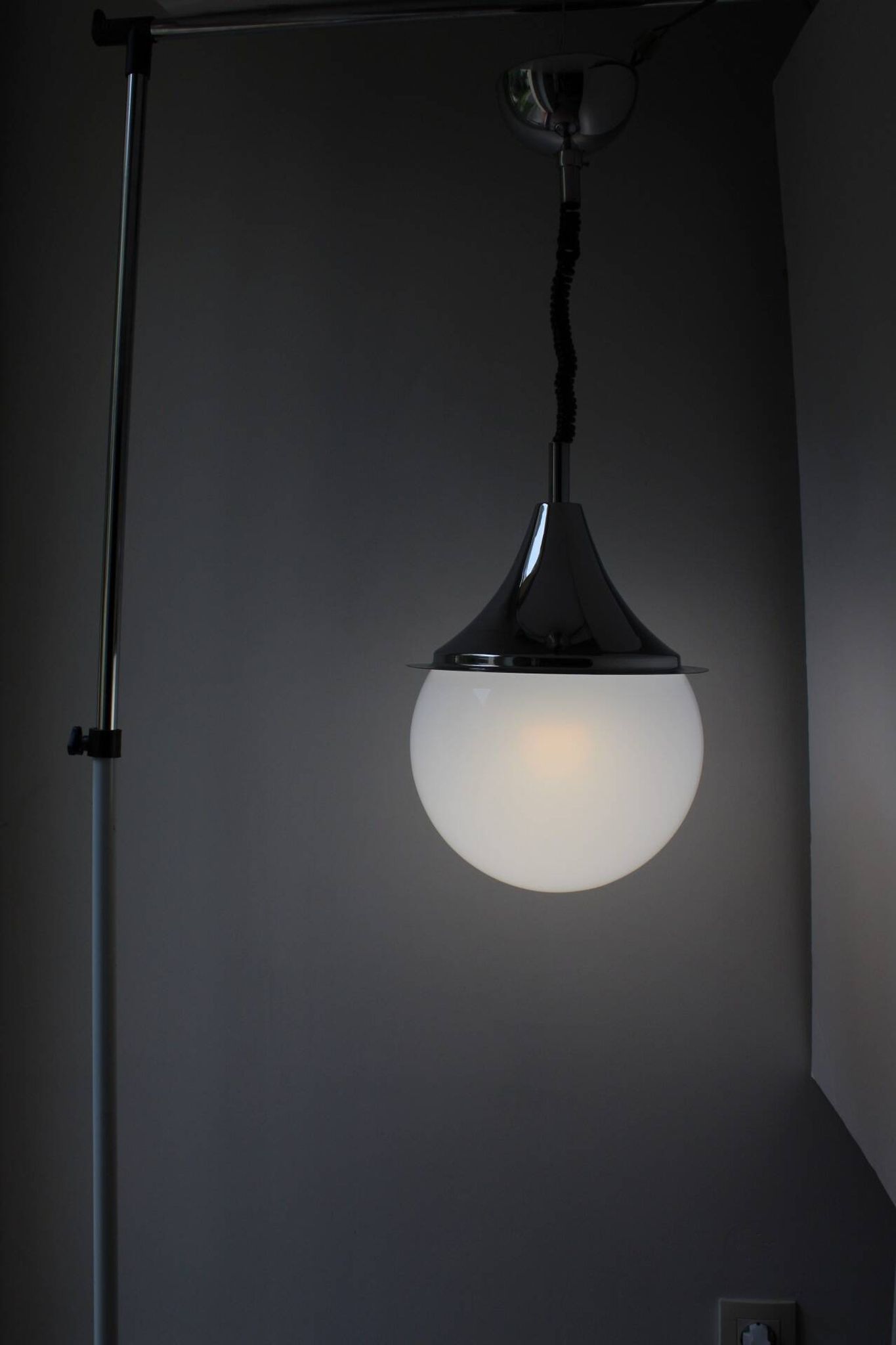 Space age glass and chrome ball suspension