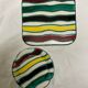 Underside and small colorful plate