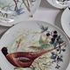 Set of six porcelain plates decorated with birds from Sologne, Limoges, signed, 25 cm