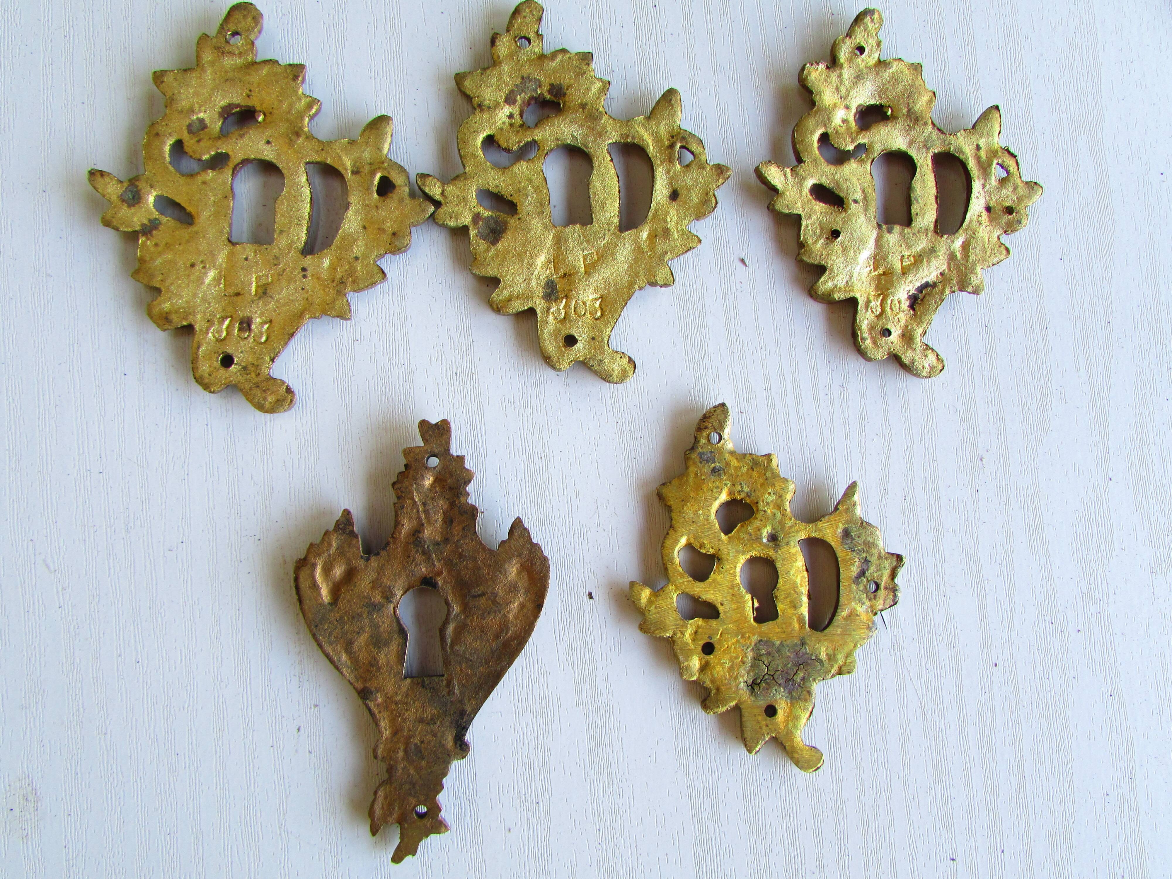 Set of 7 bronze lock entries, for antique furniture