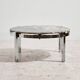 Coffee table with a stone top.