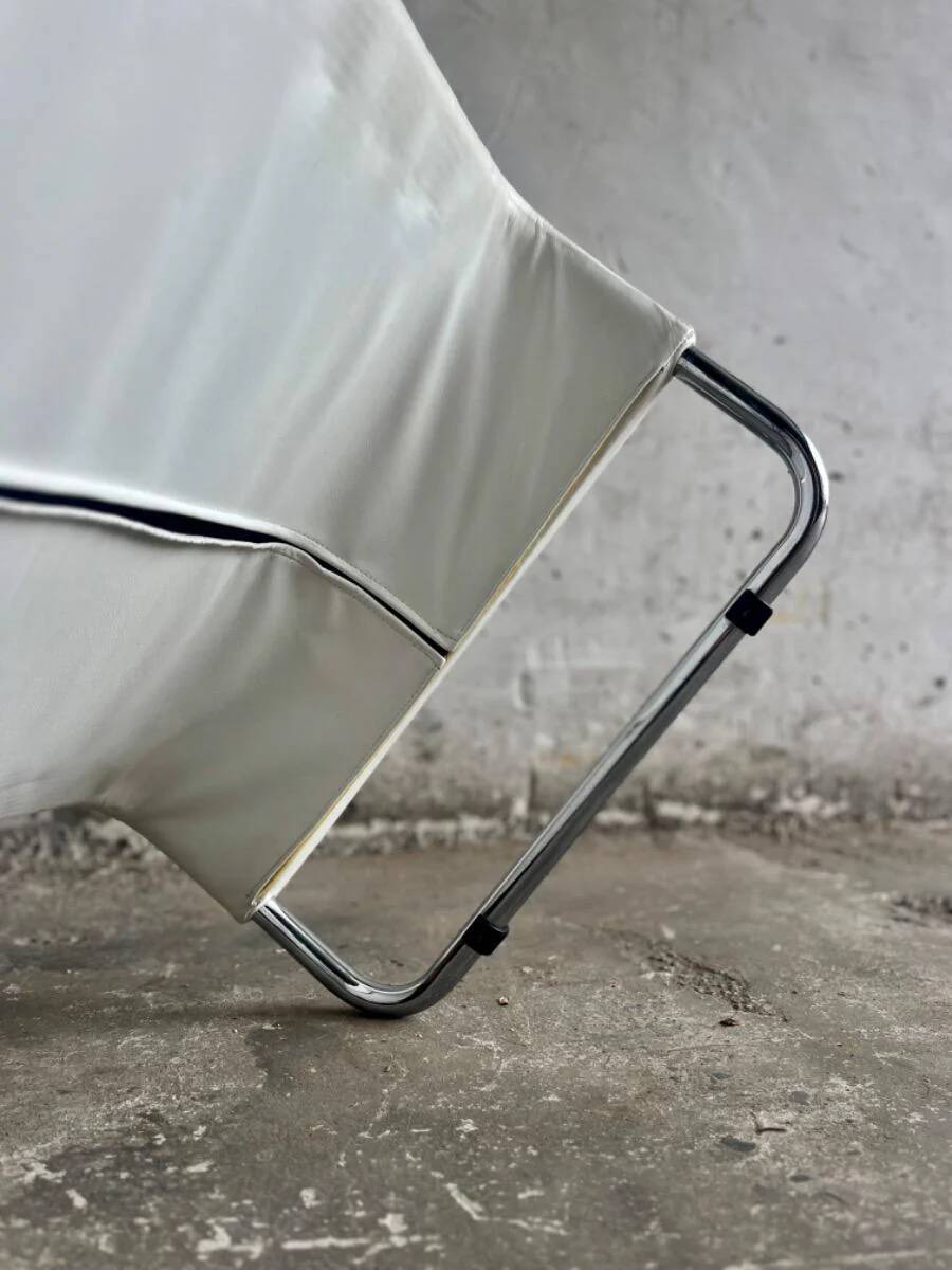 White leather Tuoli lounge chair by Antti Nurmesniemi for Cassina (1970) — chrome frame