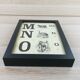 Framed m-n-o alphabet board