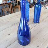 3 blue bottles