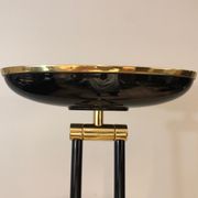 Black lacquered metal floor lamp with brass.